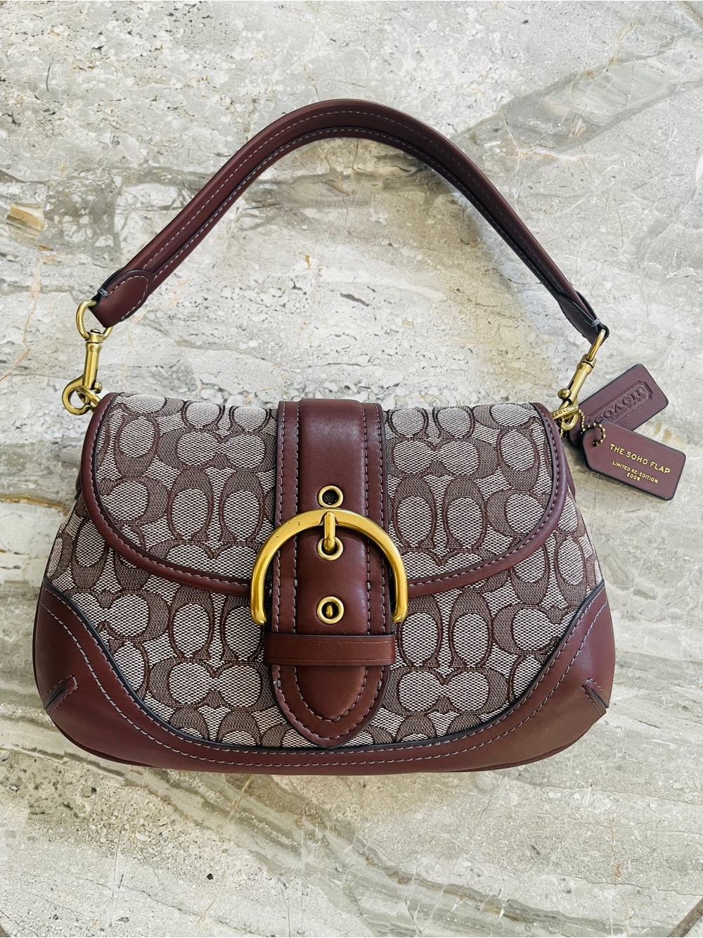 Coach Soho Flap Brown Signature Canvas & Leather excellent condition.